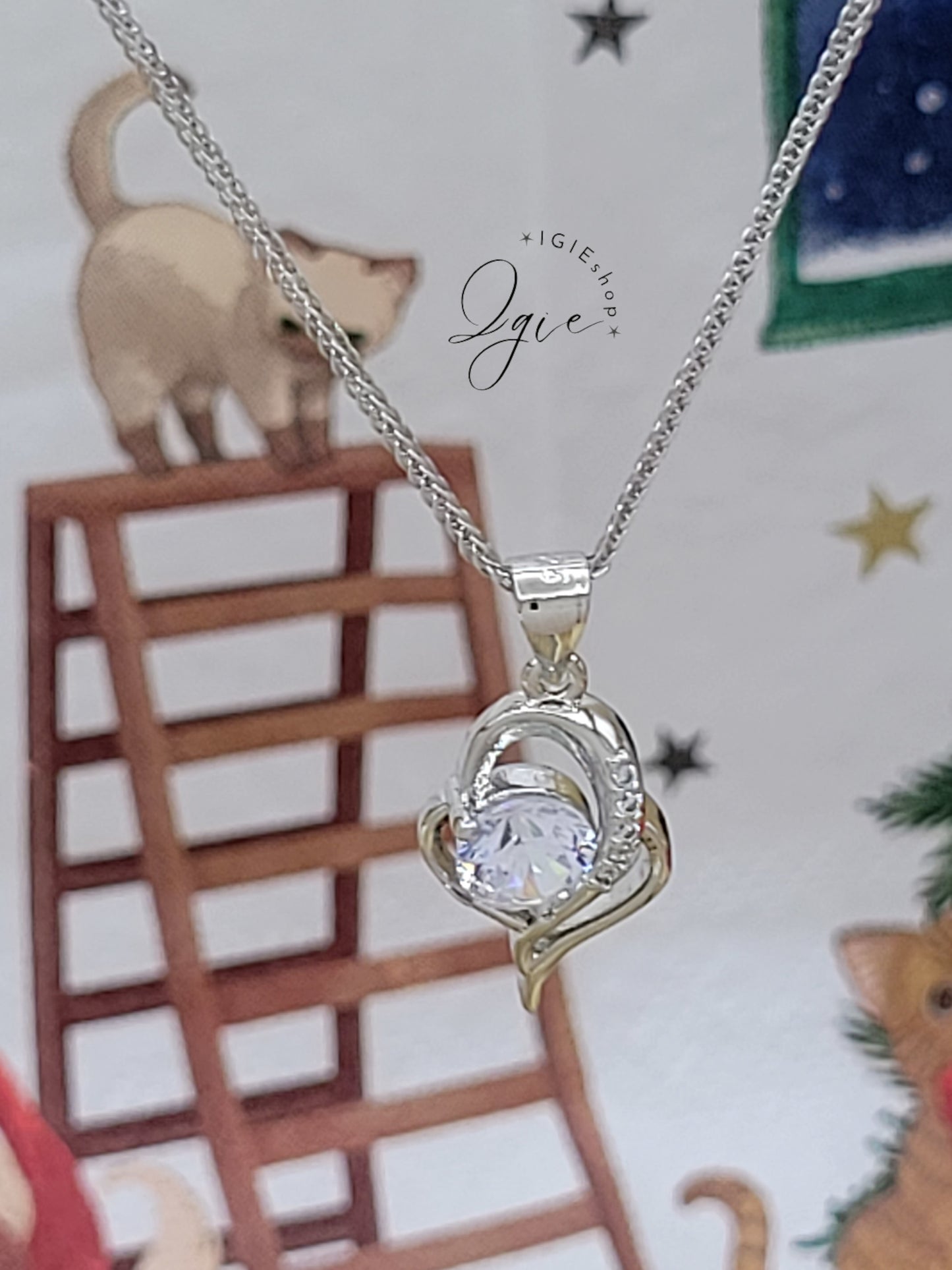 Silver necklace charm