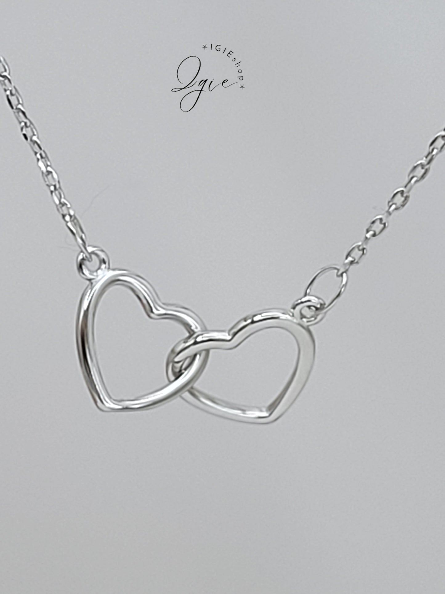 Silver necklace charm