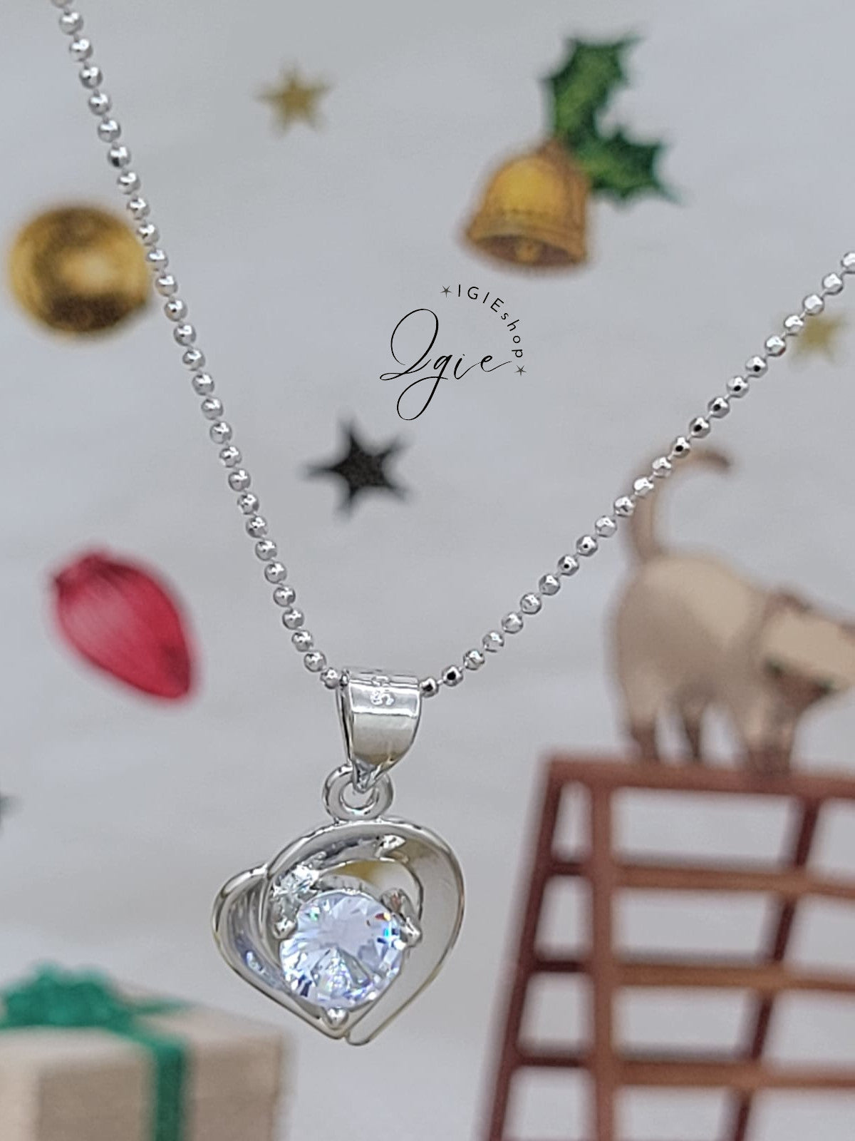 Silver necklace charm