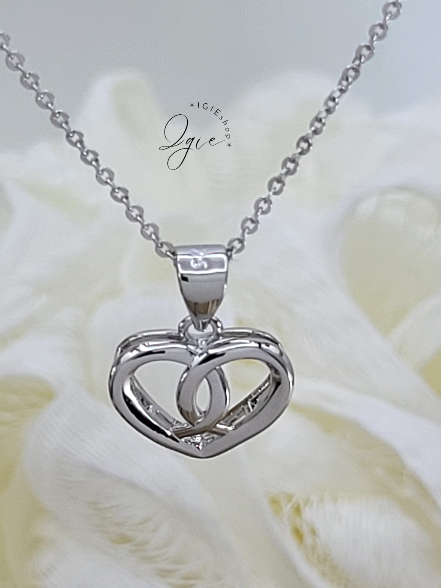 Silver necklace charm