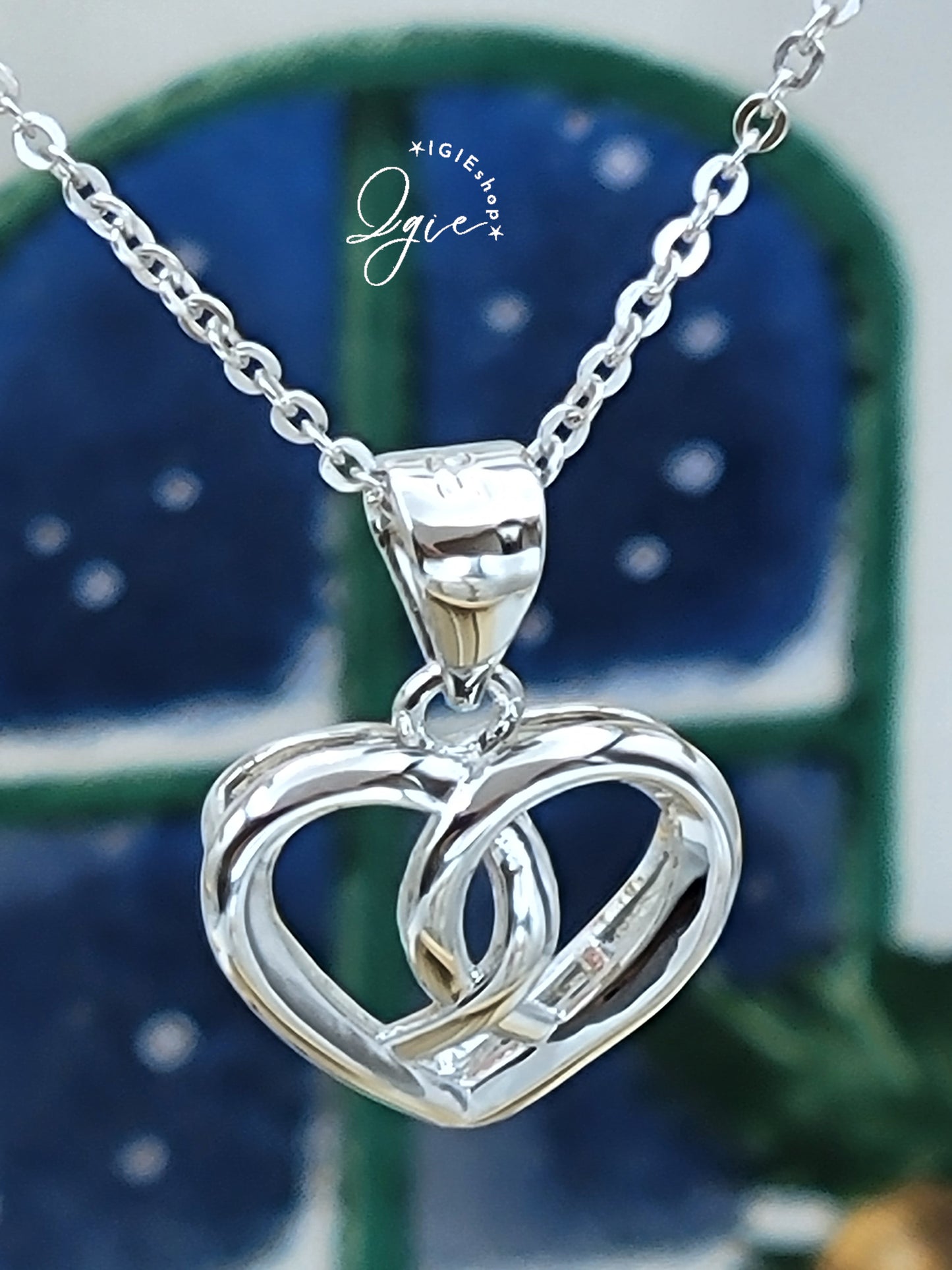 Silver necklace charm