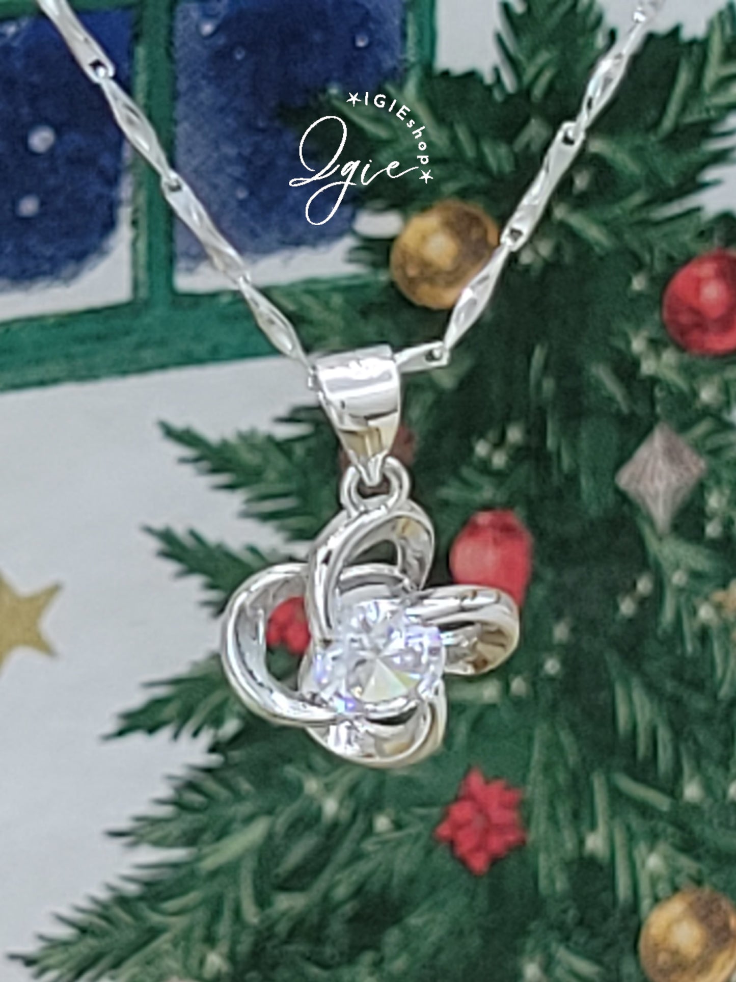Silver necklace charm