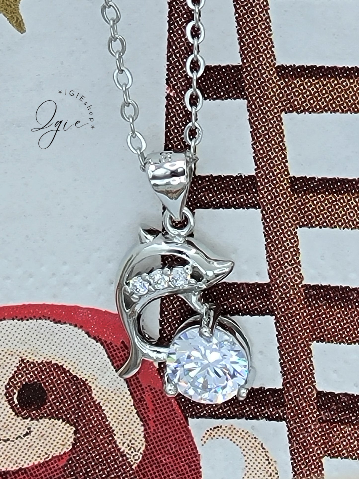 Silver necklace charm