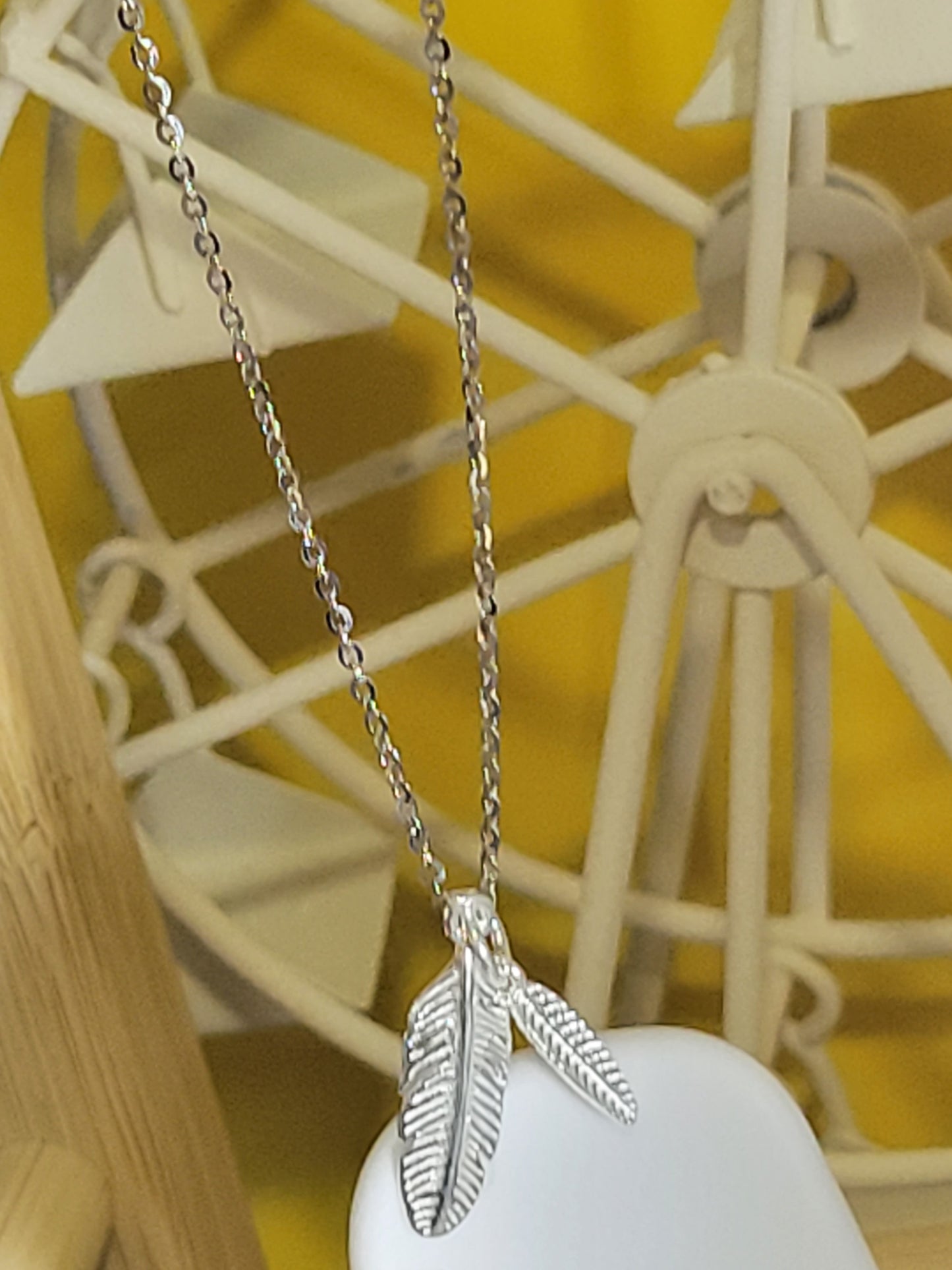 Silver necklace charm