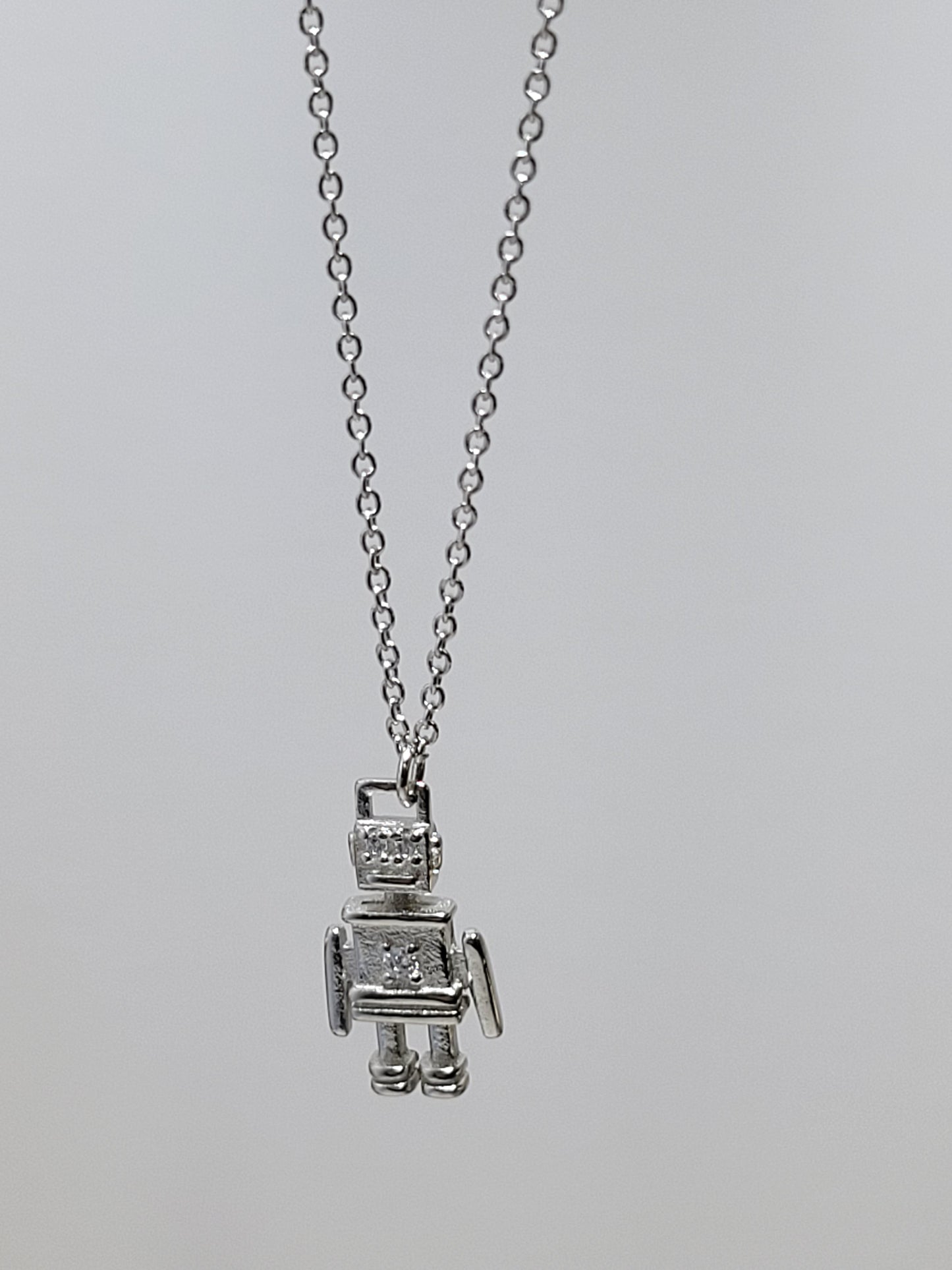 Silver necklace charm