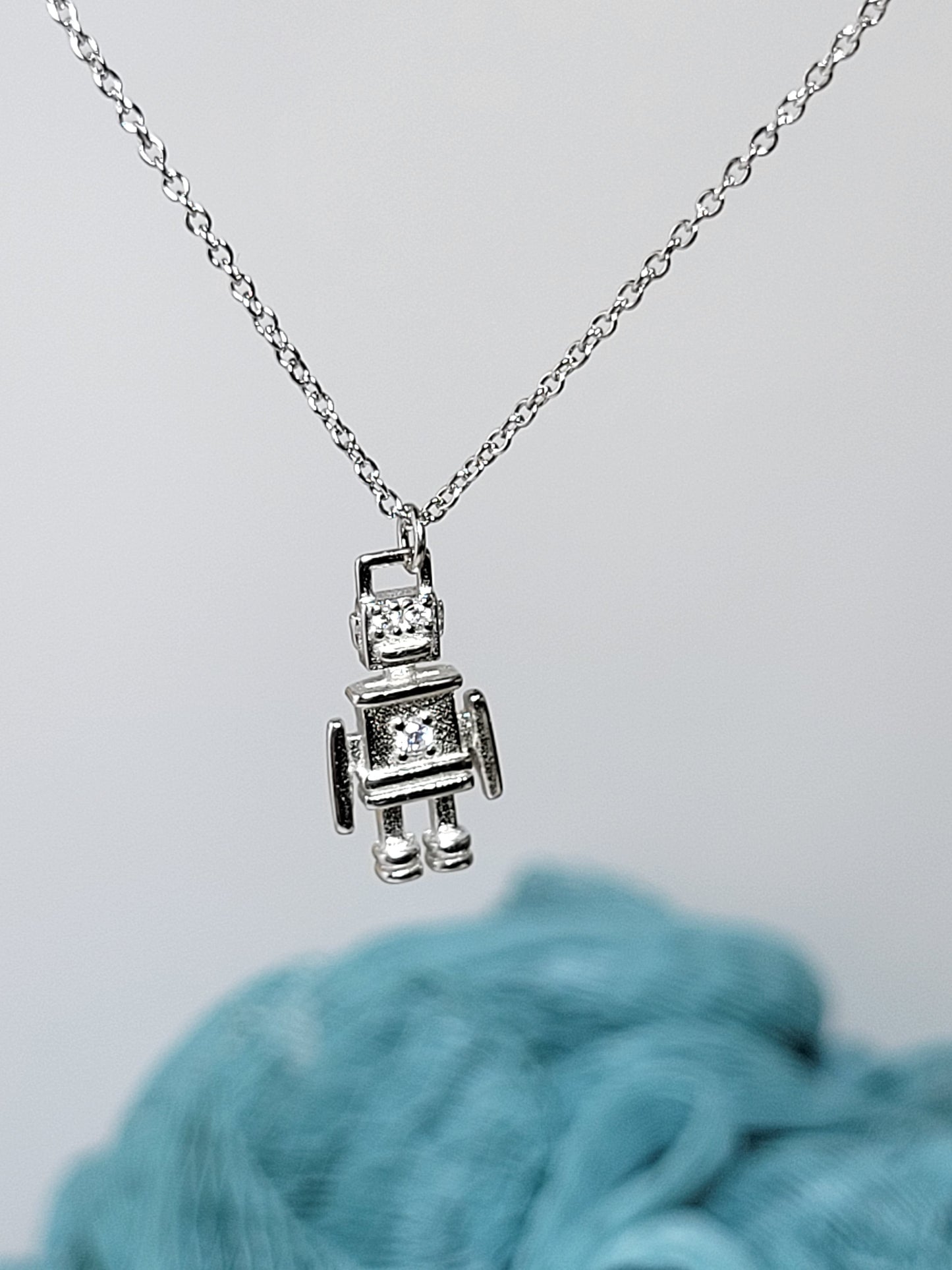 Silver necklace charm