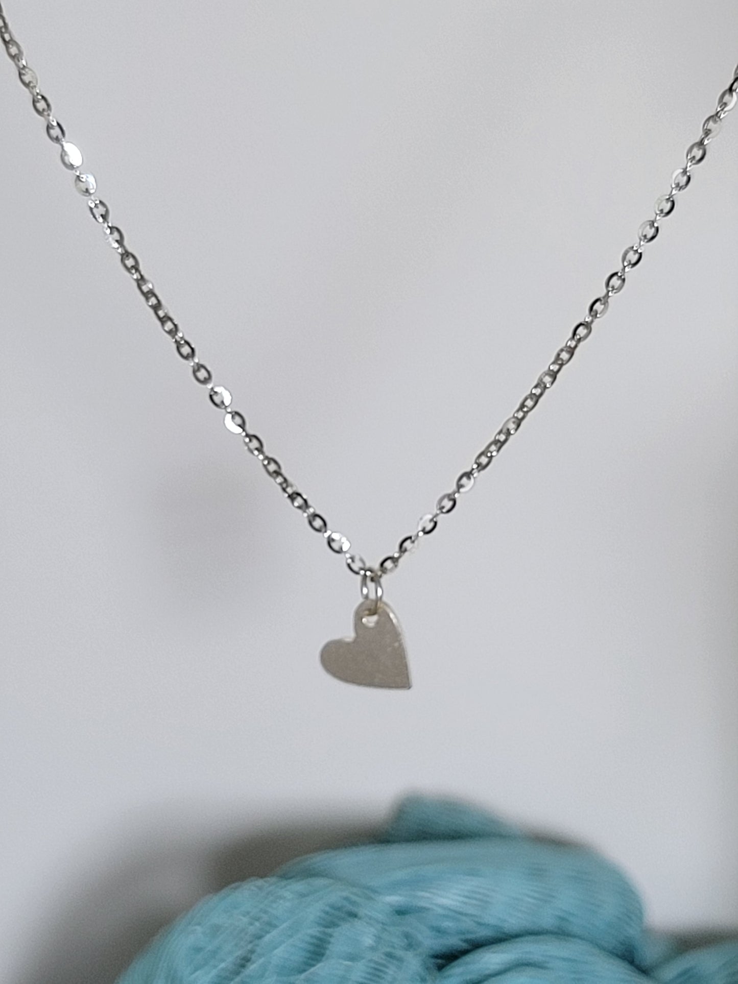 Silver necklace charm