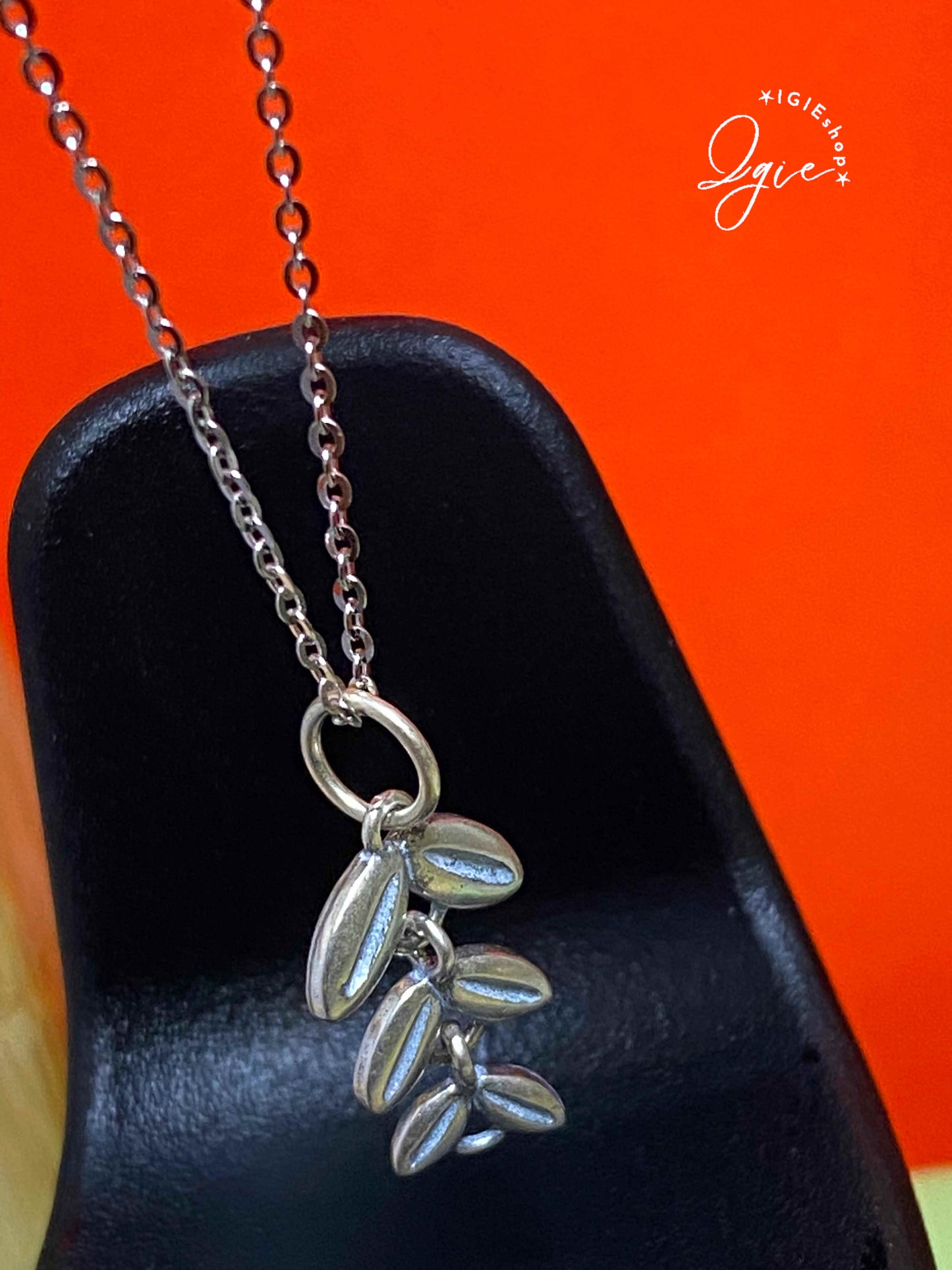 Silver necklace charm