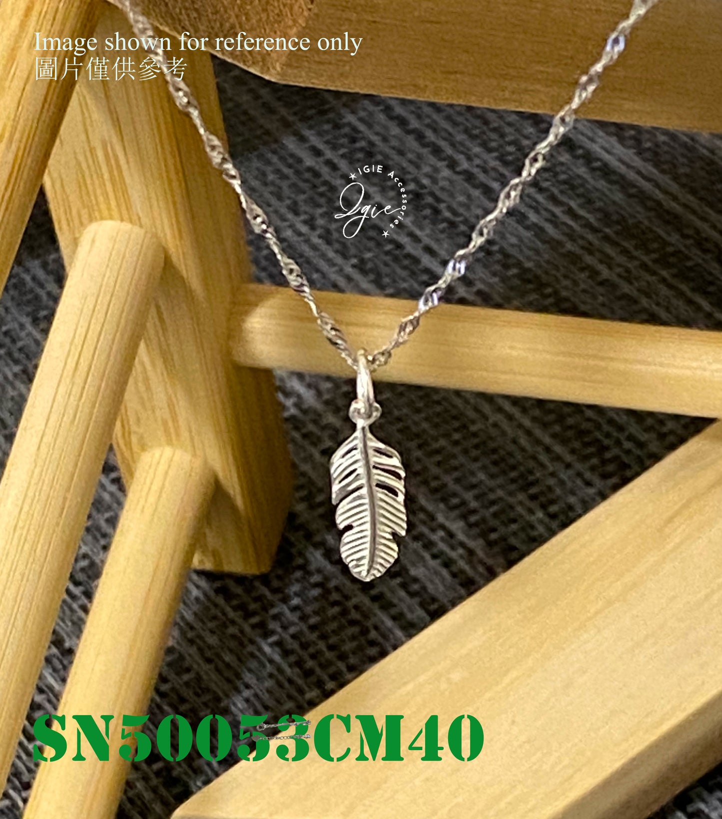 Silver necklace charm