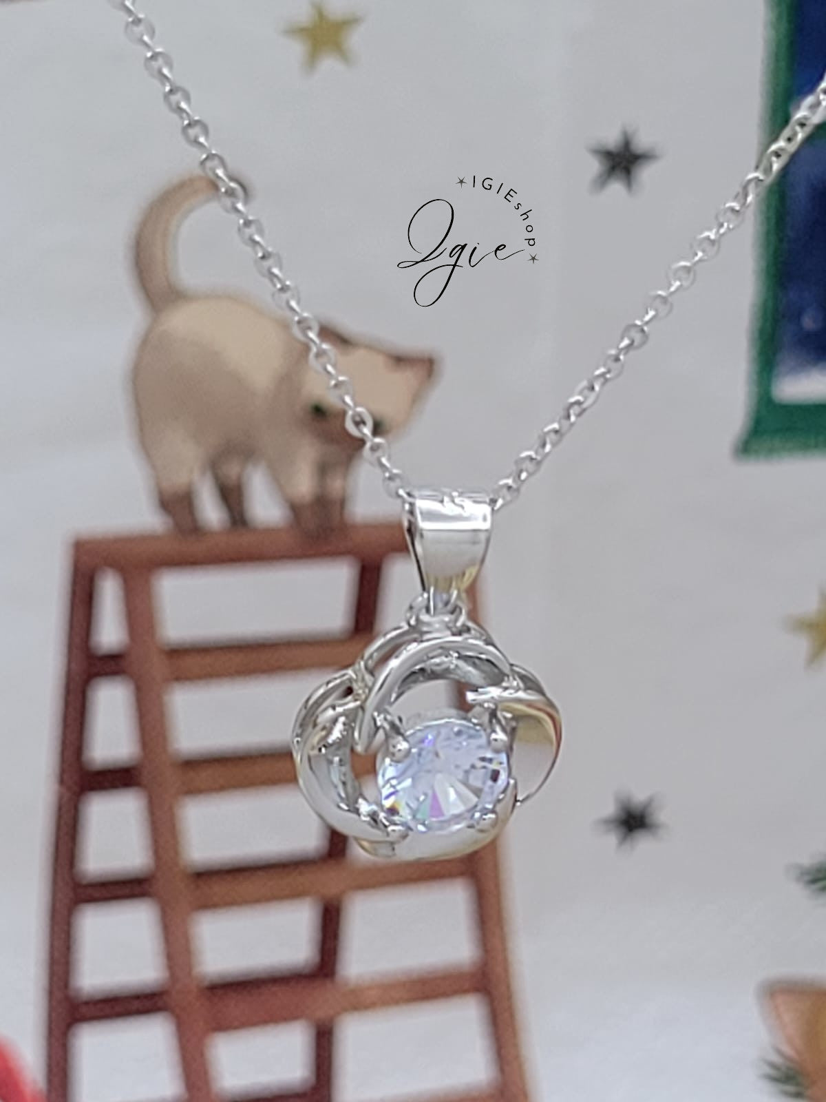 Silver necklace charm